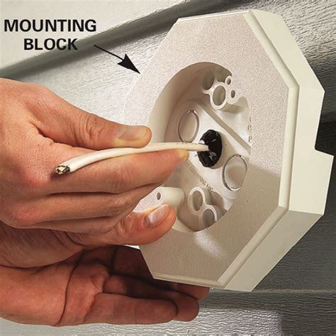 how to mount an electrical box to vinyl siding|vinyl siding doorbell mounting block.